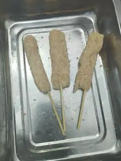 Hình ảnh xiên nem chua 
