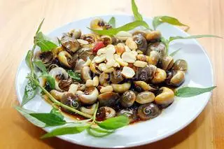 Hình ảnh ốc mỡ xào me 