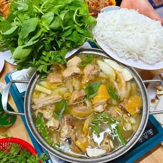 Hình ảnh Lẫu gà lá é nồi lớn 