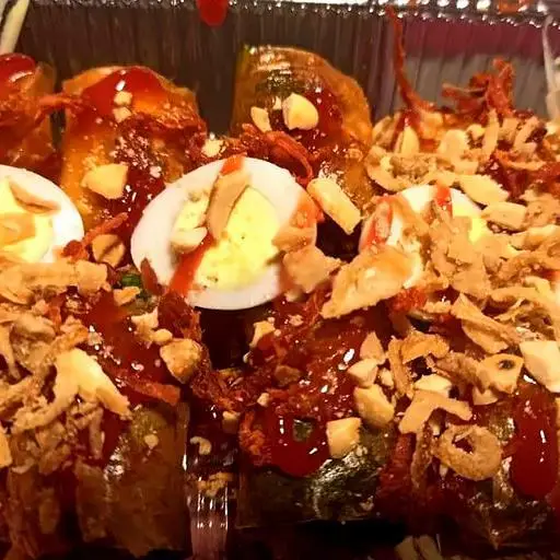 Hình ảnh Tráng Cuộn Sốt Me