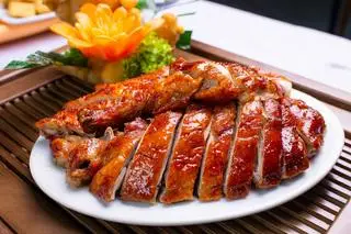 Hình ảnh Vịt Nướng Lu Nguyên Con Cắt Sẵn + 15 Nem Chua Rán Chị Hạnh + Trà Tắc