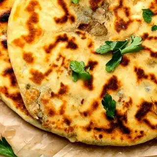 Hình ảnh Aloo Naan ( Naan Khoai Tây)