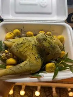 Hình ảnh GÀ HẤP LÁ CHANH NGUYÊN CON ( CHẶT SẴN)