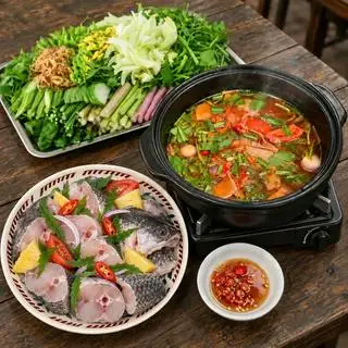 Hình ảnh Lẩu cá lóc chua cay