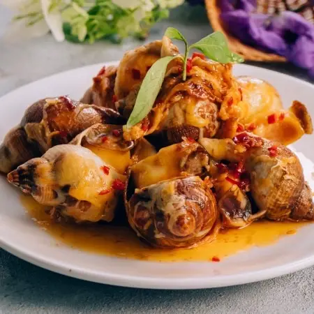 Hình ảnh ốc bulot xốt bơ cay bắp 