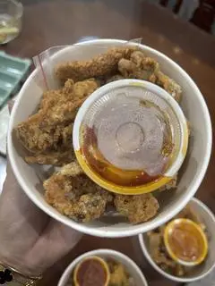 Hình ảnh rút xương chiên giòn - sốt chua cay
