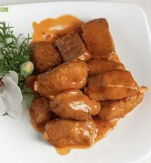 Hình ảnh SƯỜN DỪA SỐT CHUA NGỌT CHAY