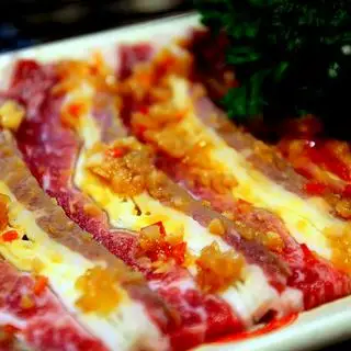 Hình ảnh Ba chỉ bò mỹ sốt tỏi nướng