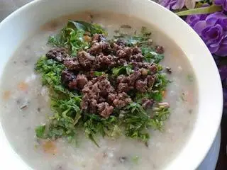 Hình ảnh Cháo bò băm ( hành lá+ tía tô)