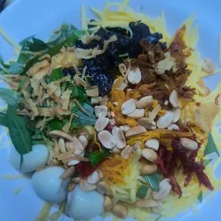 Hình ảnh gỏi xoài full toping 