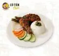 Hình ảnh Cơm đùi tỏi gà sốt chua ngọt