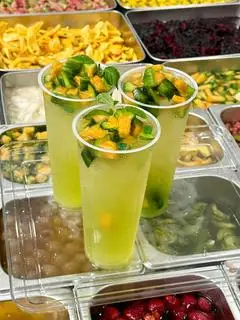 Hình ảnh Trà Dưa Lưới Ly Đại 700ml