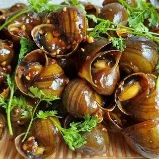 Hình ảnh Ốc Bươu Nướng Tiêu Xanh 
