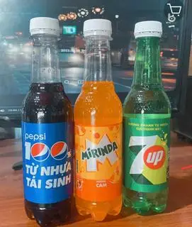 Hình ảnh  1 pesi 330ml hoặc cam mirina 330ml  hoặc 7up 330ml viết ghi chú nhé khách yêu.
