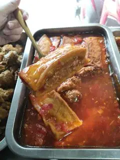 Hình ảnh Cơm đậu hũ nhồi thịt sốt cà
