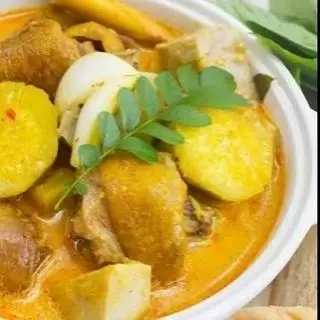 Hình ảnh hủ tiếu cari đặc biệt tặng coca