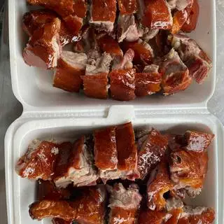 Hình ảnh vịt quay 1 con chặt 2 hộp + 6 bánh bao