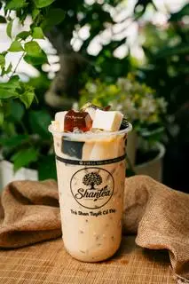 Hình ảnh Trà sữa Shan tuyết cổ thụ đặc biệt full topping (L)