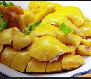 Hình ảnh Gà chặt lá chanh nguyên con + rau gỏi+ cháo + lòng trứng