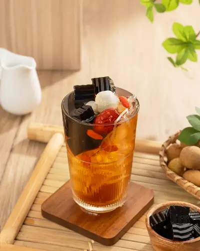 Hình ảnh trà sâm bông cúc full topping 