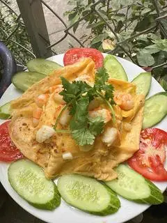 Hình ảnh Cơm chiên trùm mền hải sản 