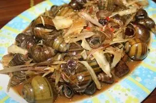 Hình ảnh Ốc lẫn xào me