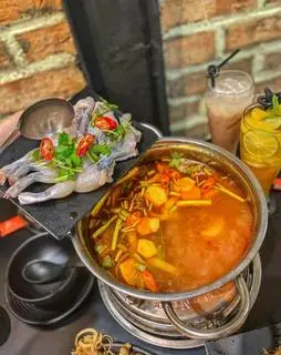 Hình ảnh LẨU ẾCH MĂNG CHUA 