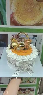 Hình ảnh bánh sinh nhật con gấu vi xoài-cam