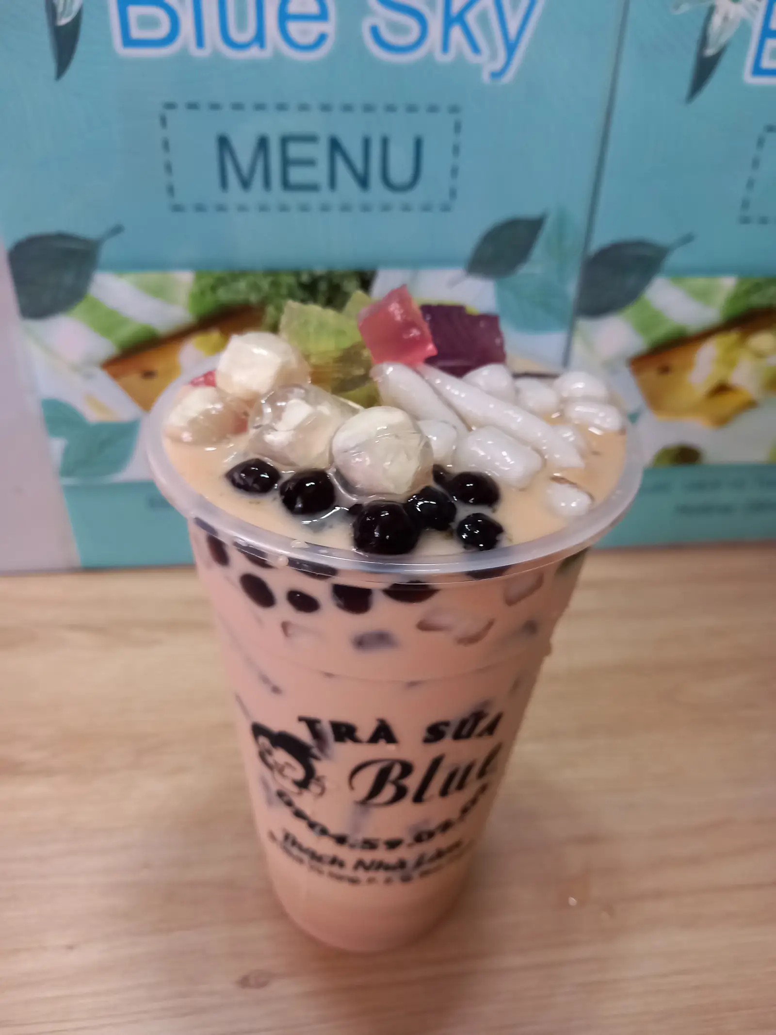 Hình ảnh Trà sữa truyền thống + TC đen, dừa, thạch trái cây, phô mai viên