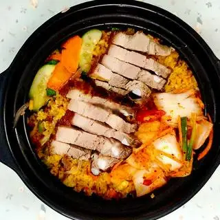 Hình ảnh Cơm đảo thịt ba chỉ quay