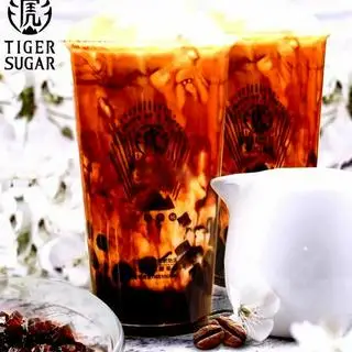 Hình ảnh Trà sữa trân châu đường đen kem trứng dừa nướng (m)