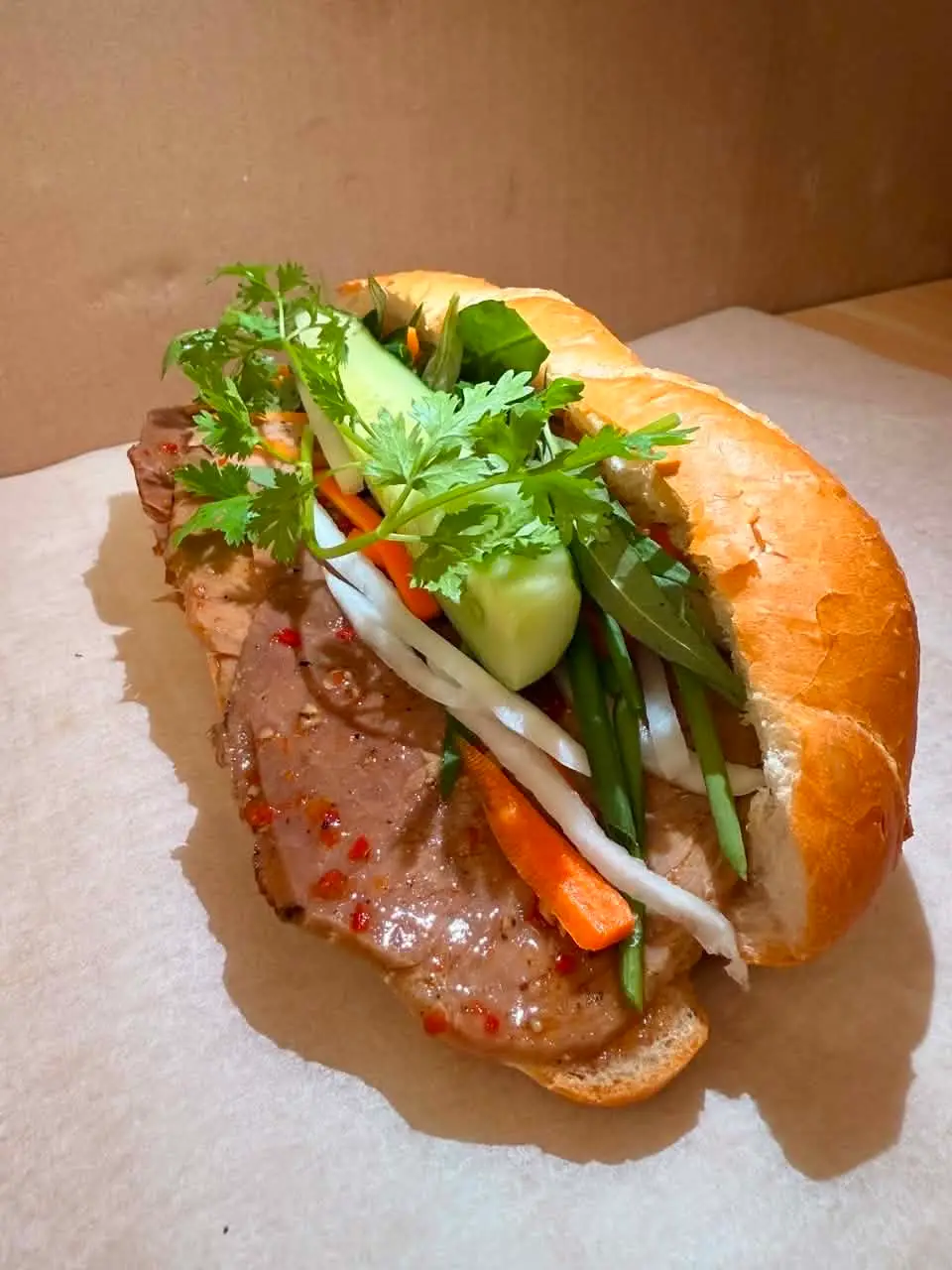 Hình ảnh bánh mì bò sate FREE 1 trà tắc thái xanh