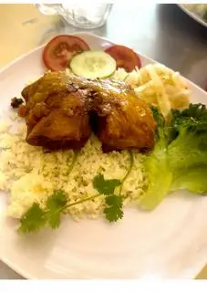 Hình ảnh cơm má đùi gà chiên mắm tỏi