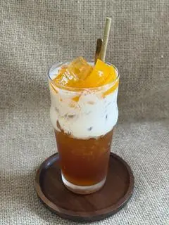Hình ảnh Trà thạch đào macchiato