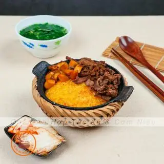 Hình ảnh Cơm Niêu Bò sốt nấm