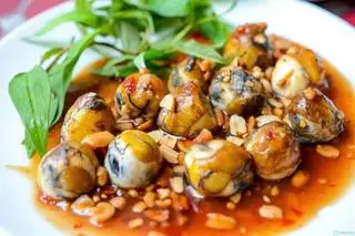 Hình ảnh Trứng cút lộn xào me 1 phần