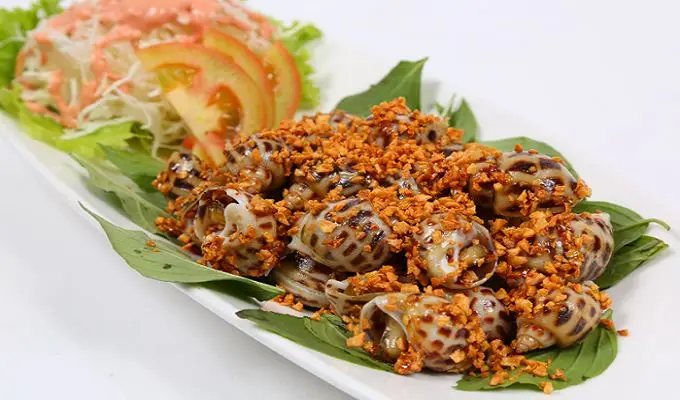 Hình ảnh Ốc hương xào tỏi