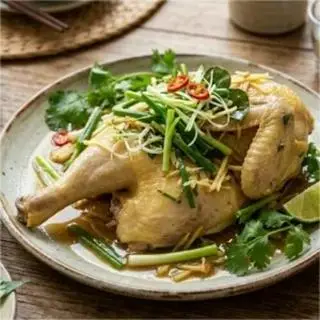 Hình ảnh Nửa con gà hấp hành(kèm 1 ống cơm lam)
