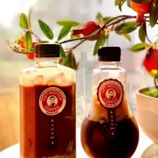 Hình ảnh Cà phê nâu bóng đèn chai