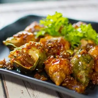 Hình ảnh Ốc bulot xào me