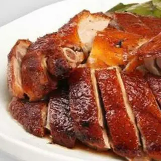 Hình ảnh Vịt nướng lá mắc mật nửa con