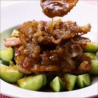Hình ảnh Cơm heo sốt tiêu đen