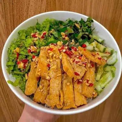 Hình ảnh Cô Quỳnh - Bún Nước Tương & Cháo Trắng - Cách Mạng Tháng Tám