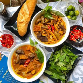 Hình ảnh Combo 2 Phá lấu bánh mì - lớn + 1 Cam Ép