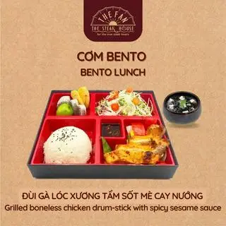 Hình ảnh Bento đùi gà sốt mè cay nước