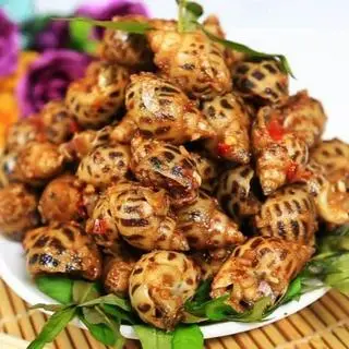 Hình ảnh Ốc hương cháy bơ tỏi
