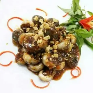 Hình ảnh Ốc mỡ rang me