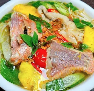 Hình ảnh Canh chua cá điêu hồng