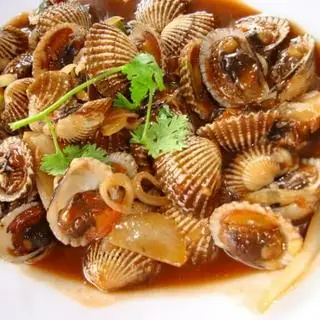Hình ảnh Sò huyết xào me