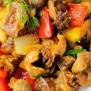 Hình ảnh Mề gà xào bơ tỏi